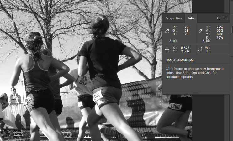 black and white photo of two women running